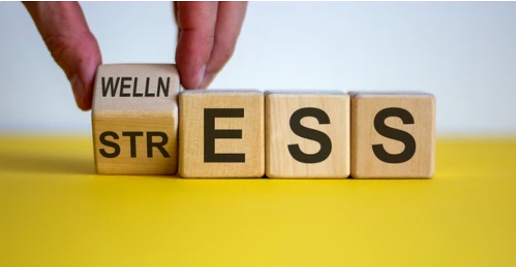 The person assembling the word blocks